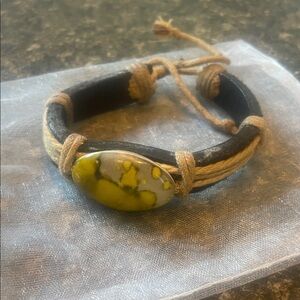 Gray, black and Yellow center piece Bracelet